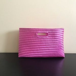 Hot pink hand woven clutch